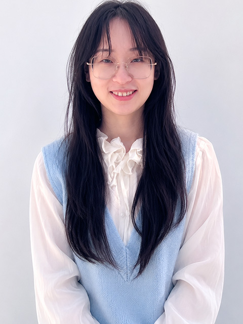 Portrait photograph of staff memeber, Torah Chen